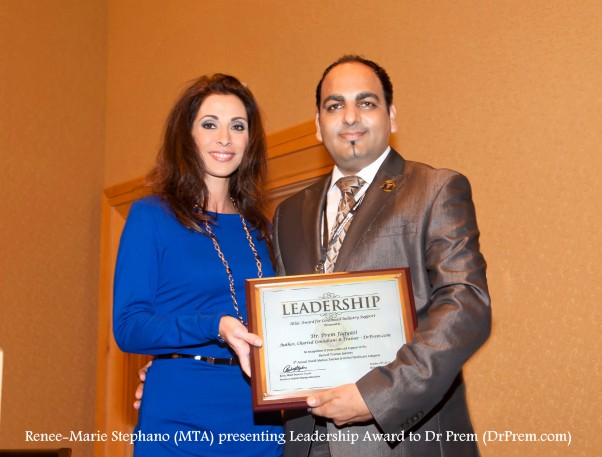 Dr Prem Recieving Leadership Award From Renee-Marie Stephano